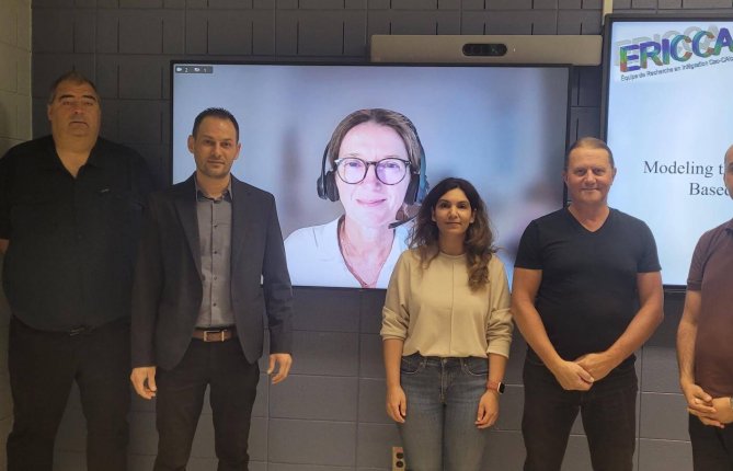 Modelling the Microstructure of a Heterogeneous Particle-Based Material With High-Volume Fraction